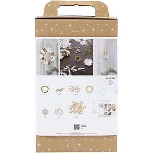 Cardboard box with wreath making instructions and patterns on a white background