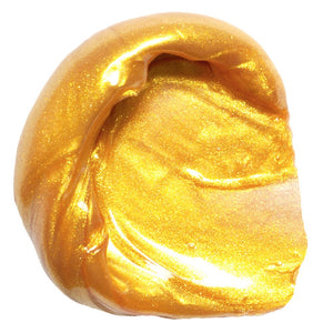 Gold paint swatch on a white background