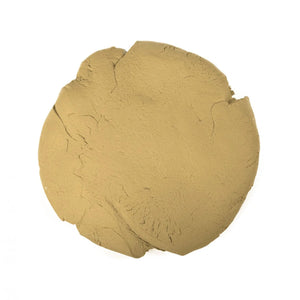Clump of beige clay on a white background