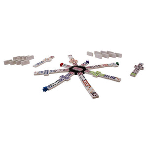 Mexican Train Dominoes laid out on a white background