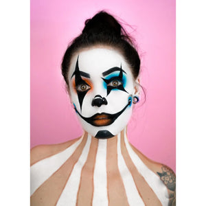 Person with clown makeup by snazaroo face paint and body paint against a pink background