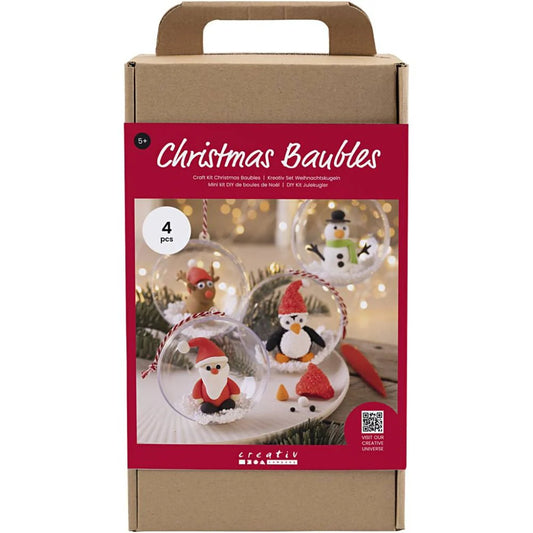 Packaging of Christmas baubles with decorative figures inside, featuring a red label and cardboard box.