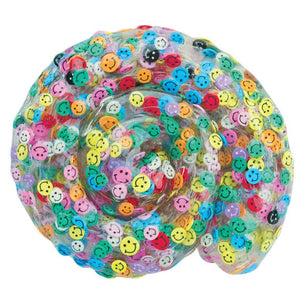 Transparent bubble ball filled with colorful smiley face beads on a white background