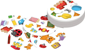 Children's party tableware with cartoon illustrations on white plates.
