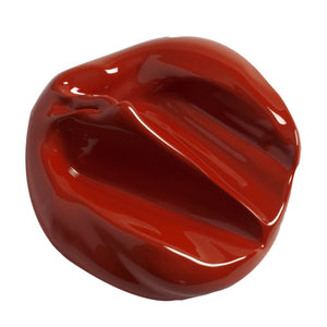 Burnt sienna paint swatch on a white background