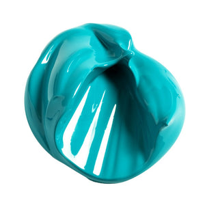 Swatch of turquoise paint on a white background