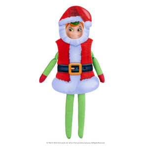 Toy elf figure with a red hat, green shirt, and white beard on a white background