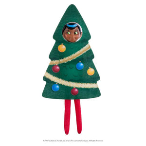 Toy figure of a character in a Christmas tree costume with colorful ornaments on a white background