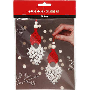 Packaged mini creative kit with red and white earrings on a brown background