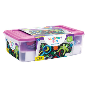 Sensory bin with pink lid and colorful packaging on a white background