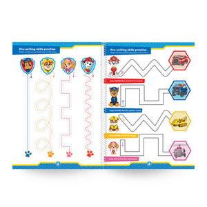 Paw Patrol activity book with pre-writing skills practice on a white background