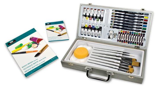 Art supply set with paints, brushes, and books in a silver case on a white background