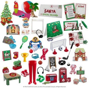 Collection of Christmas-themed elf  on the shelf toys and accessories including a tree, beach ball, and various small items.
