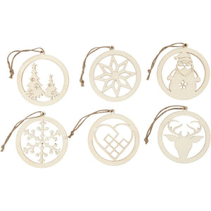 Set of six wooden Christmas ornaments with cut-out designs on a white background