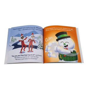 Open Elf on the Shelf Snowman book with Christmas-themed illustrations of elves and a snowman on a white background
